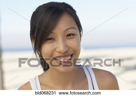 Asian woman smiling View Large Photo Image Stock Image - Asian woman smiling. Fotosearch
