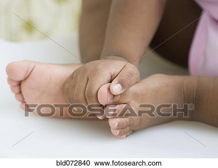 Close up of African American girl's bare feet View Large Photo Image Stock Image - Close up of African American girl's bare feet. Fotosearch