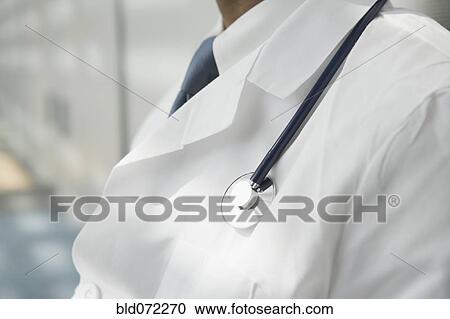 Close up of African doctor's lab coat and stethoscope View Large Photo Image Stock Image - Close up of African doctor's lab coat and stethoscope. Fotosearch