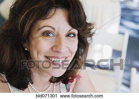 Close up of Hispanic woman smiling View Large Photo Image Stock Image - Close up of Hispanic woman smiling. Fotosearch