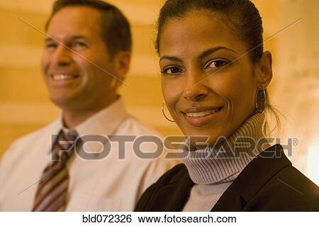 Close up of multi-ethnic business people View Large Photo Image Stock Photograph - Close up of multi-ethnic business people. Fotosearch