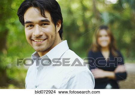 Hispanic businessman posing outdoors View Large Photo Image Picture - Hispanic businessman posing outdoors. Fotosearch