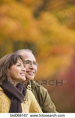 Hispanic couple outdoors View Large Photo Image Stock Photo - Hispanic couple outdoors. Fotosearch