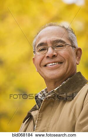 Picture - Hispanic man smiling. Fotosearch