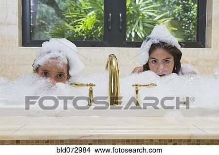 Hispanic teenage girls in bubble bath View Large Photo Image Picture - Hispanic teenage girls in bubble bath. Fotosearch