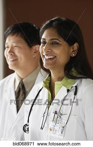 Stock Image - Indian female doctor smiling. Fotosearch