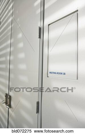 Stock Photography - Meeting room sign next to door. Fotosearch