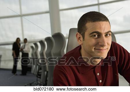 Mixed race businessman in conference room View Large Photo Image Stock Image - Mixed race businessman in conference room. Fotosearch