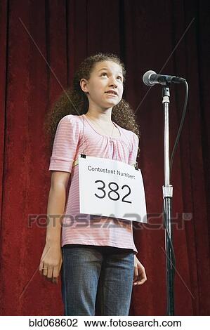 Mixed race girl competing in spelling bee View Large Photo Image Stock Image - Mixed race girl competing in spelling bee. Fotosearch