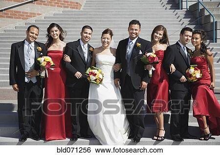 Multi-ethnic bridal party outdoors View Large Photo Image Stock Photograph - Multi-ethnic bridal party outdoors. Fotosearch