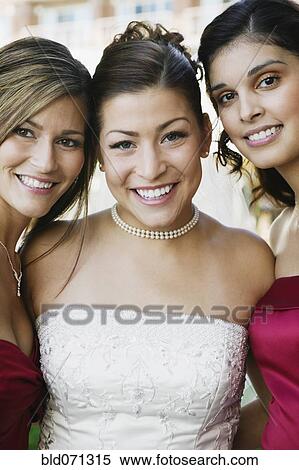 Stock Photography - Multi-ethnic bride and bride's maids. Fotosearch