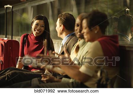 Multi-ethnic businesspeople talking View Large Photo Image Stock Image - Multi-ethnic businesspeople talking. Fotosearch