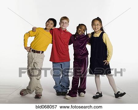 Multi-ethnic children hugging View Large Photo Image Stock Photo - Multi-ethnic children hugging. Fotosearch