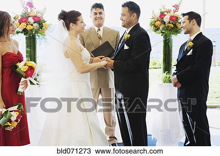 Multi-ethnic couple getting married View Large Photo Image Stock Image - Multi-ethnic couple getting married. Fotosearch