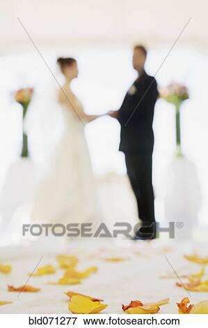 Stock Photo - Multi-ethnic couple getting married. Fotosearch