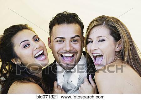 Multi-ethnic friends laughing View Large Photo Image Stock Image - Multi-ethnic friends laughing. Fotosearch