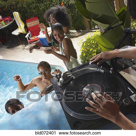 Multi-ethnic group of friends enjoying pool party View Large Photo Image Stock Image - Multi-ethnic group of friends enjoying pool party. Fotosearch