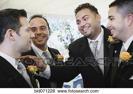 Stock Photo - Multi-ethnic men wearing tuxedos. Fotosearch