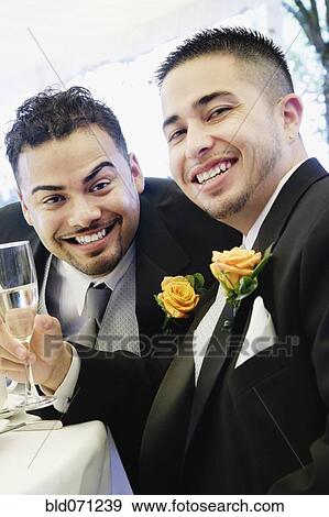 Stock Photo - Multi-ethnic men wearing tuxedos. Fotosearch