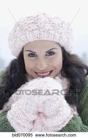 Portrait of Hispanic woman wearing winter clothing View Large Photo Image Stock Photography - Portrait of Hispanic woman wearing winter clothing. Fotosearch