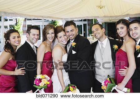 Stock Image - Portrait of multi-ethnic bridal party. Fotosearch