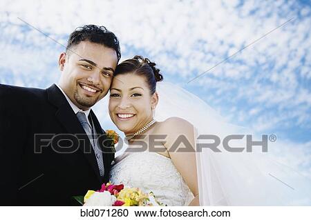 Portrait of multi-ethnic bride and groom View Large Photo Image Stock Image - Portrait of multi-ethnic bride and groom. Fotosearch