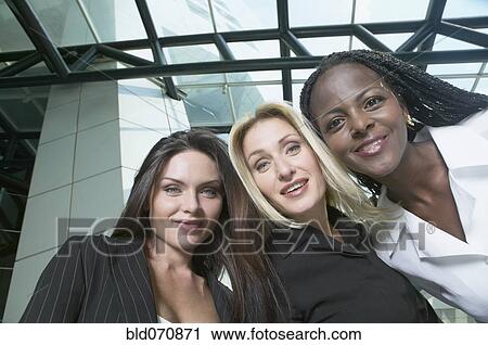 Stock Image - Portrait of multi-ethnic businesswomen. Fotosearch