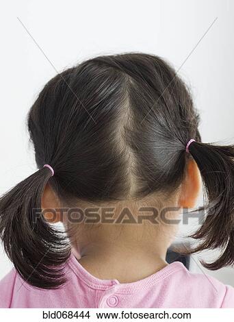 Rear view of girl with pigtails View Large Photo Image Picture - Rear view of girl with pigtails. Fotosearch