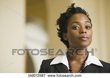 Stock Photo - Serious African businesswoman. Fotosearch