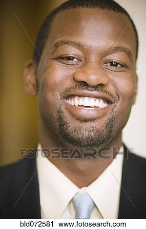Smiling African businessman View Large Photo Image Stock Image - Smiling African businessman. Fotosearch