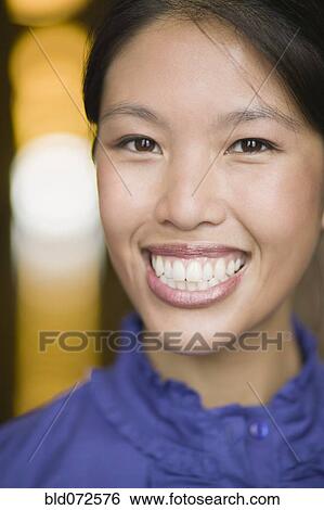 Stock Photograph - Smiling African woman. Fotosearch
