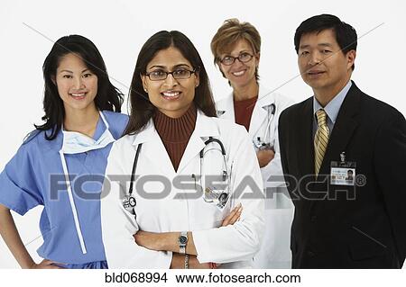 Picture - Studio shot of doctors smiling. Fotosearch