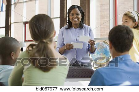 Stock Photo - Teacher asking students questions. Fotosearch