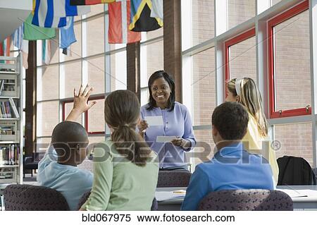 Teacher asking students questions View Large Photo Image Stock Photography - Teacher asking students questions. Fotosearch