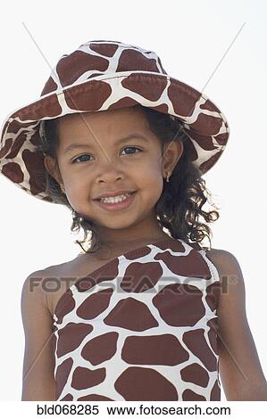 Young mixed race girl in bathing suit and hat View Large Photo Image Stock Photography - Young mixed race girl in bathing suit and hat. Fotosearch