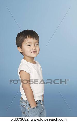 Hispanic boy with hands in pockets View Large Photo Image Stock Image - Hispanic boy with hands in pockets. Fotosearch