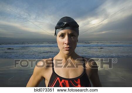 Hispanic woman in bathing suit on beach View Large Photo Image Stock Image - Hispanic woman in bathing suit on beach. Fotosearch