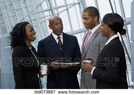 Stock Photo - African businesspeople talking. Fotosearch
