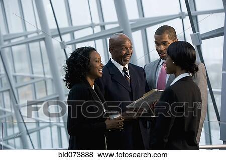 Stock Photo - African businesspeople talking. Fotosearch