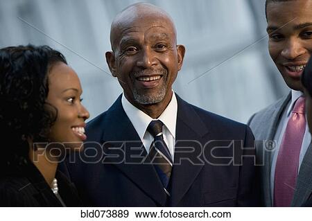Stock Photo - African businesspeople talking. Fotosearch