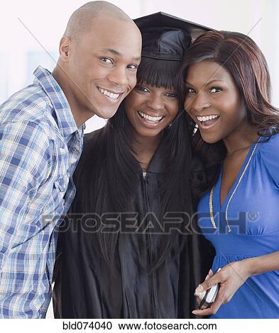 African friends congratulating graduate View Large Photo Image Stock Image - African friends congratulating graduate. Fotosearch
