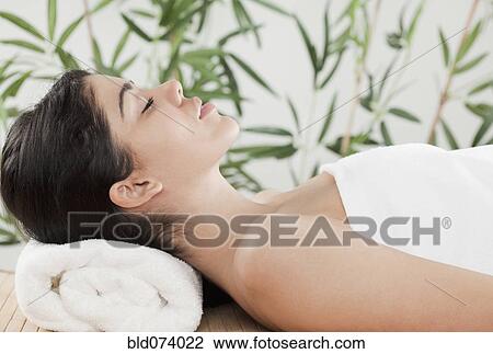 Hispanic woman laying in spa View Large Photo Image Stock Image - Hispanic woman laying in spa. Fotosearch