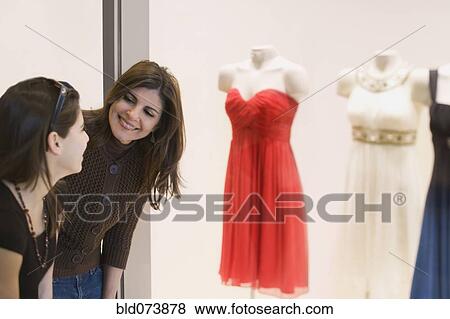 Middle Eastern mother and daughter window shopping View Large Photo Image Stock Photo - Middle Eastern mother and daughter window shopping. Fotosearch