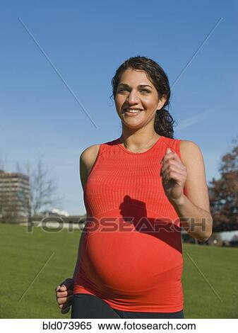 Pregnant Middle Eastern woman walking for exercise View Large Photo Image Stock Photography - Pregnant Middle Eastern woman walking for exercise. Fotosearch