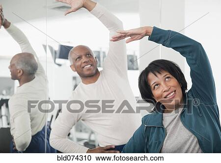 African couple exercising in health club View Large Photo Image Stock Image - African couple exercising in health club. Fotosearch