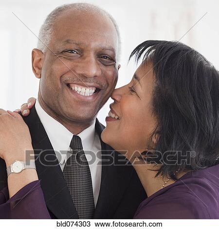 African couple hugging View Large Photo Image Stock Image - African couple hugging. Fotosearch