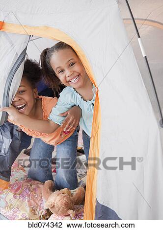 African girls playing in tent View Large Photo Image Stock Image - African girls playing in tent. Fotosearch