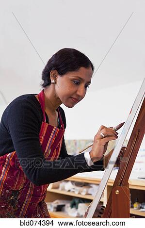 Indian woman painting View Large Photo Image Picture - Indian woman painting. Fotosearch