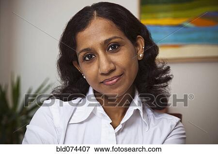 Indian woman smiling View Large Photo Image Stock Photo - Indian woman smiling. Fotosearch