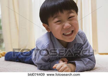 Korean boy grinning View Large Photo Image Stock Photo - Korean boy grinning. Fotosearch